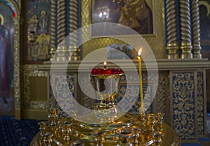 A lamp and a candle in an Orthodox church