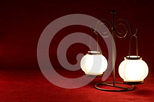 Lamp on carmine background