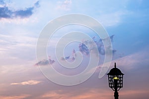 Lamp and golden light sky during the evening sunset view