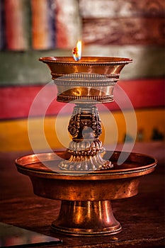 Lamp in gompa Tibetan Buddhist monastery. Ladadkh, India