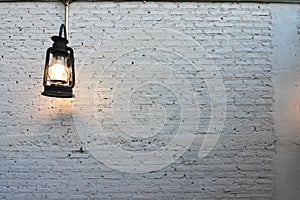 Lamp lantern on an old brick wall