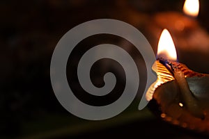 Lamp lit during Indian festival and offering of food to god