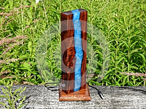 Lamp made of solid wood sucupira and epoxy resin photo