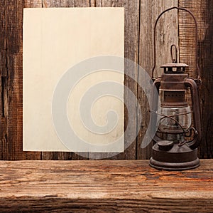 Lamp oil lantern paper blank old wooden