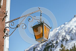 Lamp on old wooden house