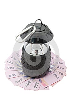 Lamp over thai money isolated on white with clipping path