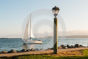 Lamp and Path with Sail Boat in San Diego Bay