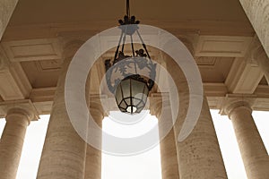 Lamp and pillars on Piazza San Pietro in Vatican