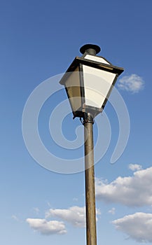 Lamp post. Art of one vintage street illuminator on sky.