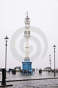 Lamp post and clock tower victorian style at maritime custom quay greenock inverclyde coast sea ocean uk photo