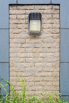 Lamp on the stone wall