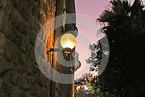 Lamp on street of stone old city Jaffa in Tel Aviv