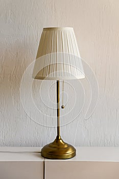 lamp on the table and blank space with white wall background