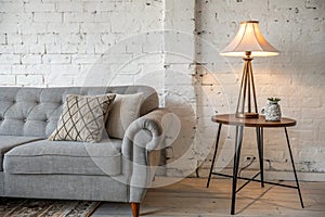 Lamp on table in white loft interior