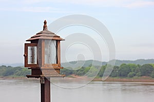 Lamp on terrace and river background