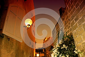 Lamp and view of the street of stone old city Jaffa in Tel Aviv, Israel