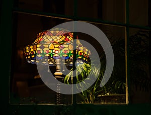 Lamp in window at Night