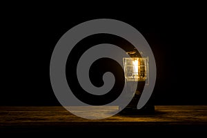 Lamp on wood floor with lighting