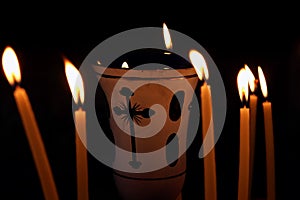 Lampade surrounded by candles photo