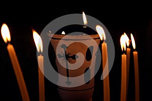 Lampade surrounded by candles