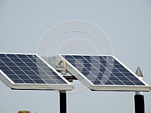 lamppost powered by clean energy of solar cells panel, or photovoltaic cell, an electronic device that converts the energy of