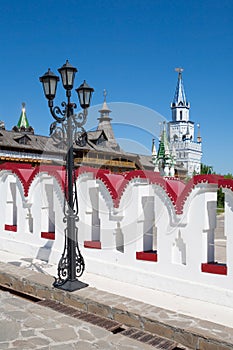 Lamppost and towers of the Moscow Kremlin photo