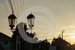 Lamppost in vintage style at sunset