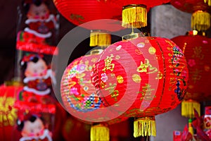 Lamps and red garments for use during Chinese New Year.