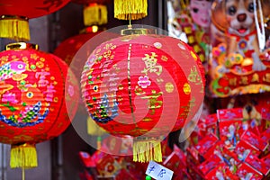 Lamps and red garments for use during Chinese New Year.