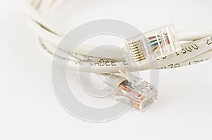 Lan head with computer network cable on white background