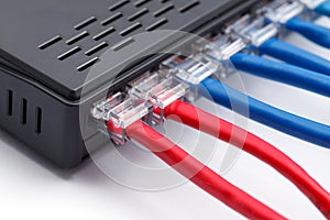 LAN network switch with ethernet cables plugged in