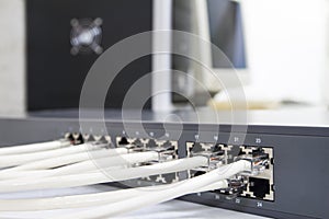 Lan network switch with ethernet cables plugged in