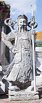 Lan Than Chinese Rock Giants with weapons represent noble warriors in Chinese opera-style garment in Wat Pho, Bangkok, Thailand
