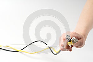 Lan wires cat5 cat6. hand holds wires with high speed internet access. Internet technologies of the future. connect to