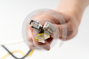 Lan wires cat5 cat6. hand holds wires with high speed internet access. Internet technologies of the future. connect to
