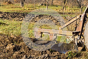 Land cultivation seasonal worker farm tractor plowing field