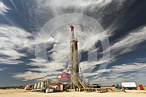 Land Drilling Rig and Cloudy Sky