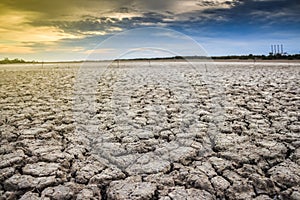 Land with dry and cracked ground. Desert