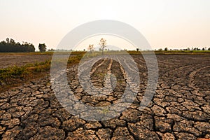 Land during the dry season The parched land and the hot sun. Impact on global warming