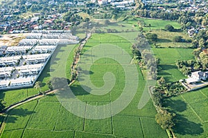 Land and house in aerial view.