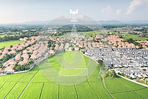 Land, house, residential area and satellite in aerial view.