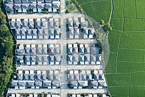 Land and house in top view.