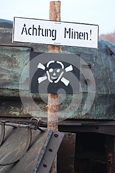 Land mine warning sign