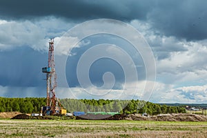 Land oil drilling rig blue sky