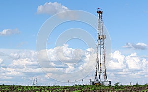 Land oil drilling rig on field