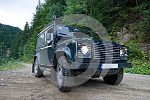 Land Rover on forest road