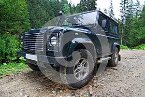 Land Rover on forest road