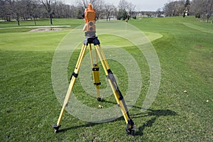 Land surveying the golf course