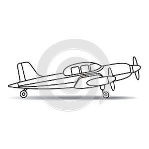 Landed black and white small propeller aircraft