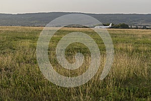 Landed plane at the airport